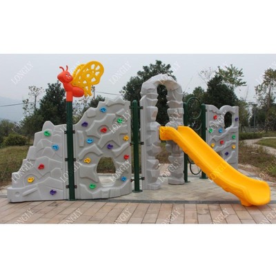 Children's rock climbing wall with plastic slide